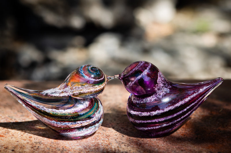 glass bird with cremation ash